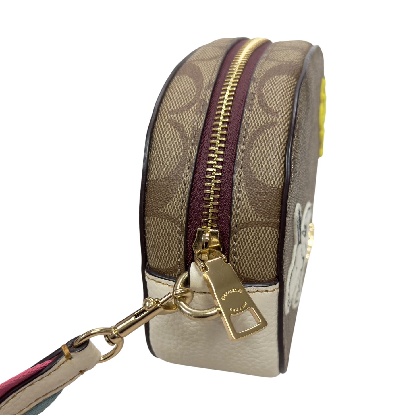 Coach 聯乘 Snoopy 斜揹袋